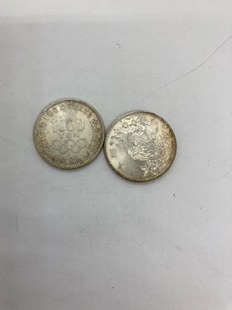 オリンピックの1000円硬貨をお買取り致しました!