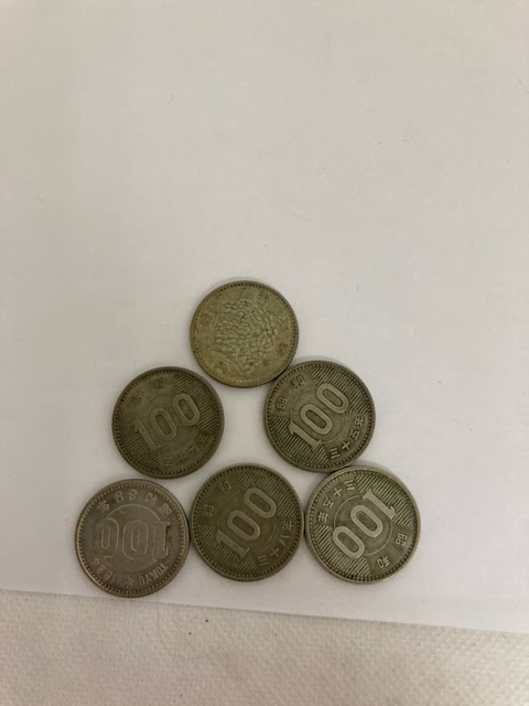 稲穂100円銀貨をお買取り致しました。